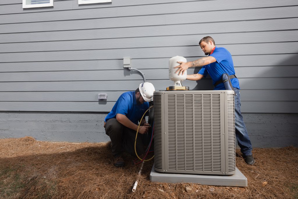 HVAC Technicians Working Outdoor